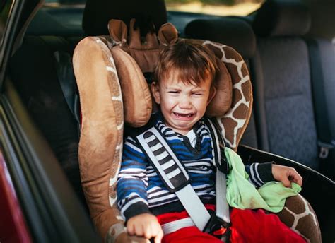 Premium Photo Crying Baby Boy In Car Seat