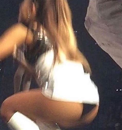 Ariana Grande Shows Off Her Butt Boots Bra And Blonde Hair