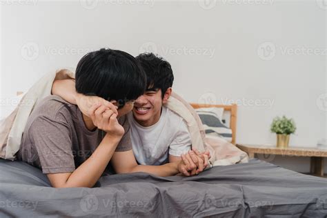 Handsome Asian Gay Couple Talking On Bed At Home Young Asian Lgbtq Guy Happy Relax Rest