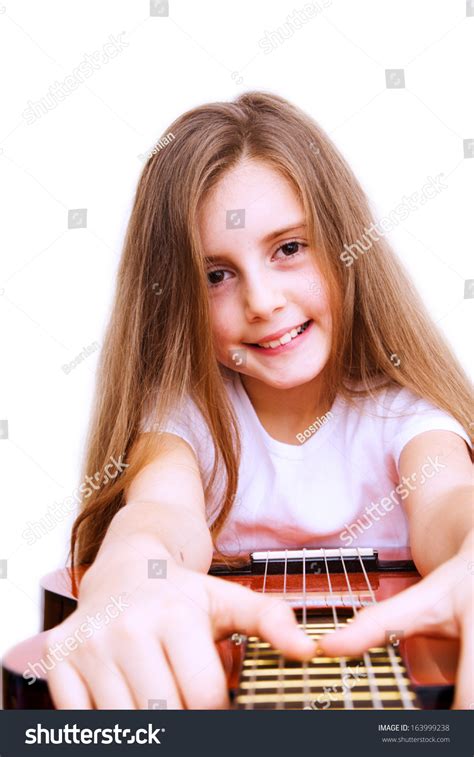 Little Girl Playing Guitar Stock Photo Edit Now 163999238
