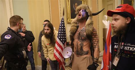 Fact Check Face Painted Man In Horned Fur Cap At Capitol Riot Supports Trump And QAnon Not Antifa