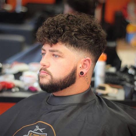 This classy combover top has been given a flashy razor fade that is perfectly consistent all round. Drop_Fade_Curly_1 - World Trends Fashion