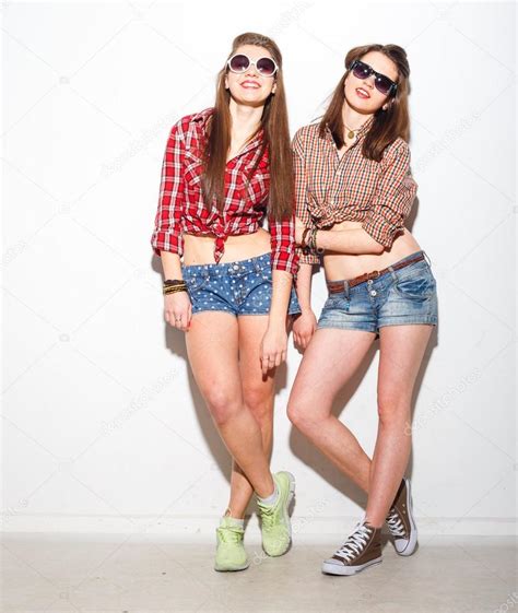 Close Up Fashion Lifestyle Portrait Of Two Young Hipster Girls Best