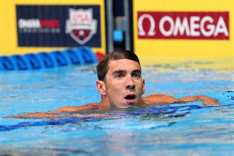 olympic swimmer michael phelps fails to beat out some sharks