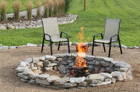 Add in a lumber yard fire pit and metal patio table. How to Build a Stone Fire Pit DIY Projects Craft Ideas & How To's for Home Decor with Videos