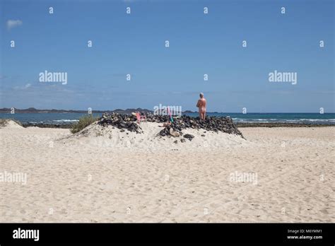 Naturists Sunbathing At Playa De Moro Beach At Corralejo Fuerteventura In The Canary Islands