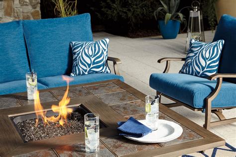 Partanna Square Fire Pit Table Set By Signature Design By Ashley