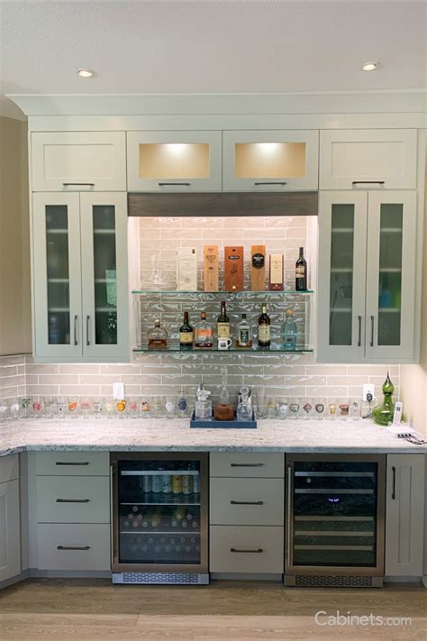 We love a good budget remodel, and that's exactly what kaitlin and her husband sent us. Bar with Lift-Up Cabinet Doors | Modern bar, Free kitchen ...