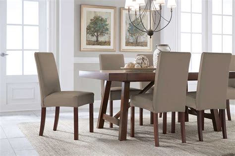 These are not your grandmother's slippery plastic covers. Serta Reversible Stretch Suede Dining Chair Slipcovers ...