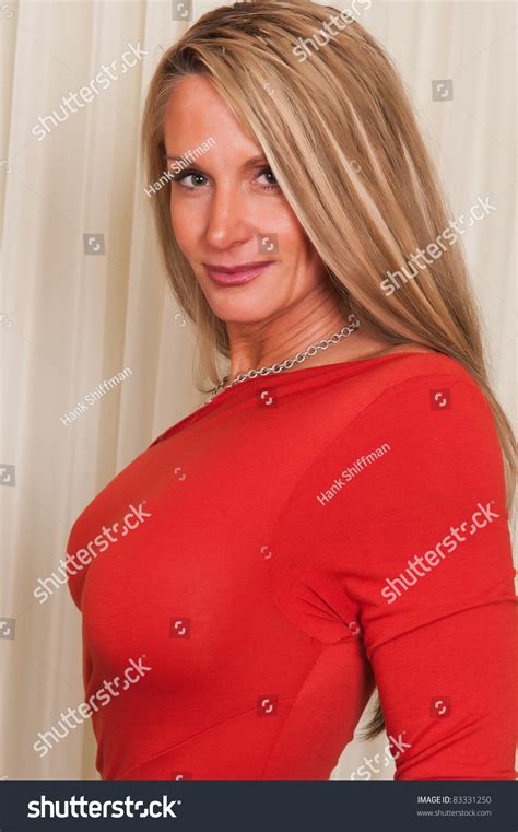 Beautiful Mature Blonde Red Dress Foto De Stock 83331250 Shutterstock