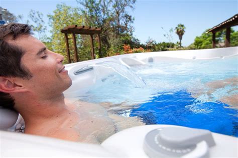 Avoid Working Out With Sore Muscles A Hot Tub Is A Tool For Recovery Hot Spring Spas Sore