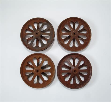Vintage Rusty Metal Pulley Wheels With Heart Cutouts