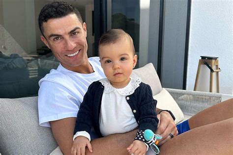Cristiano Ronaldo Cuddles 9 Month Old Daughter Bella In Cute Photo