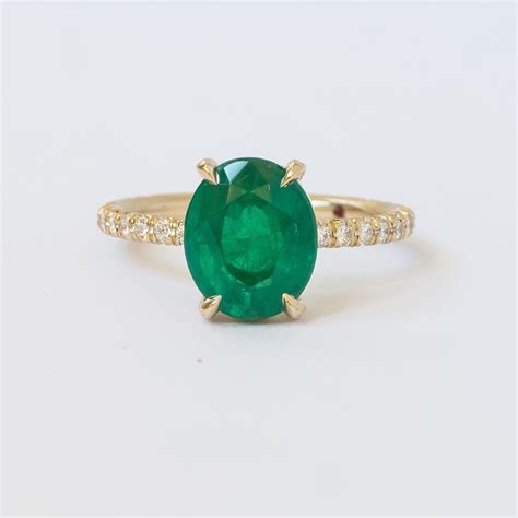 Emerald Oval Engagement Ring In Yellow Gold Emeralds