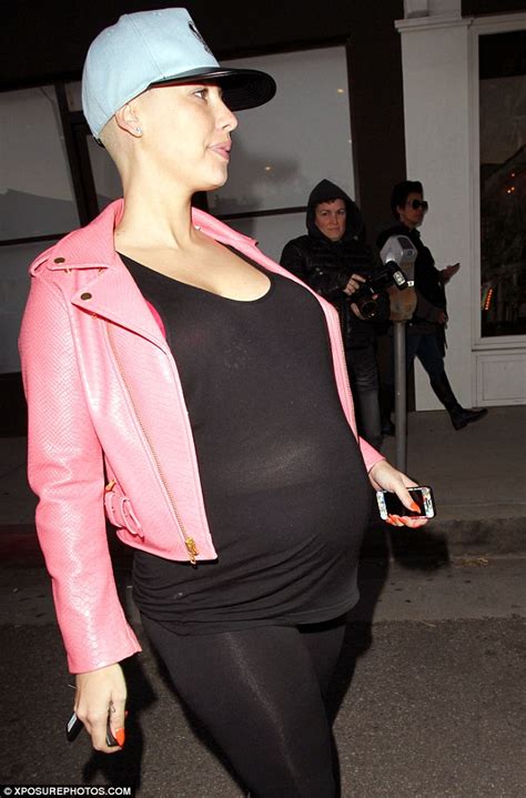 Blossoming Amber Rose Proudly Showed Off Her Huge Baby Bump In Clinging Lycra Workout Attire As