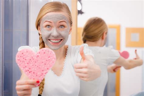 Woman Having Grey Face Mask Holding Heart Sponge Stock Image Image Of