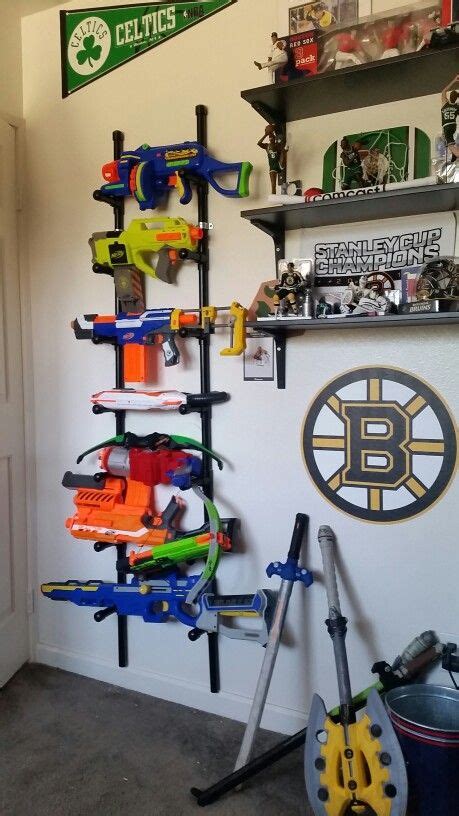 Add pegs, hooks, and baskets for extra storage. Diy Nerf Gun Storage : Nerf Storage Ideas A Girl And A Glue Gun - In this video, i'll show you ...