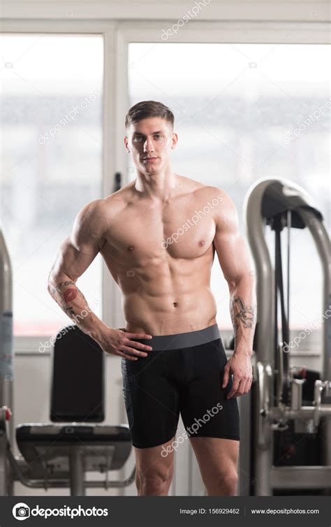 Portrait Of A Physically Fit Muscular Man — Stock Photo © Ibrak 156929462