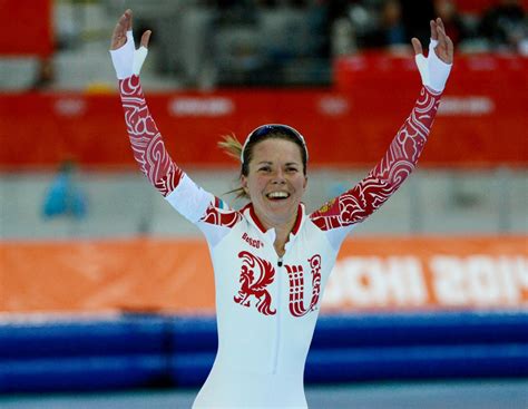 Russian Speed Skater Olga Graf Unzips Suit After Win