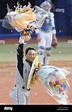 YOKOHAMA, Japan - Hanshin Tigers' Tomoaki Kanemoto acknowledges fans ...