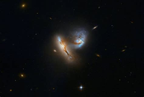 Hubble Captures Galaxies Interacting Cosmos Magazine