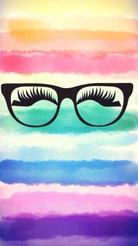 A Pair Of Eyeglasses With Long Eyelashes On Top Of Rainbow Colored
