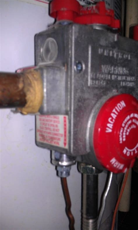 Remove the pilot light access cover. Used Rheem 50gal Water Heater - Pilot Won't Light...Any ...