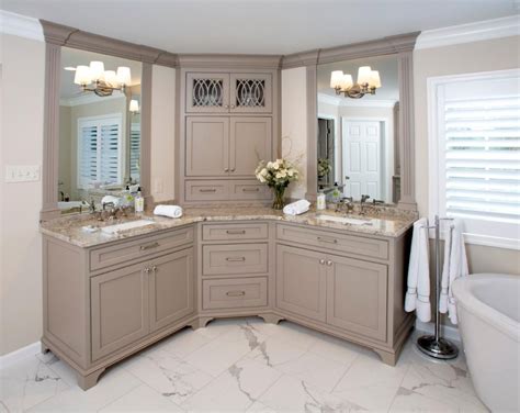 Its six drawer fronts come with handles in a shiny finish. Custom corner double vanity was installed in this award winning bathroom renovation… | Corner ...