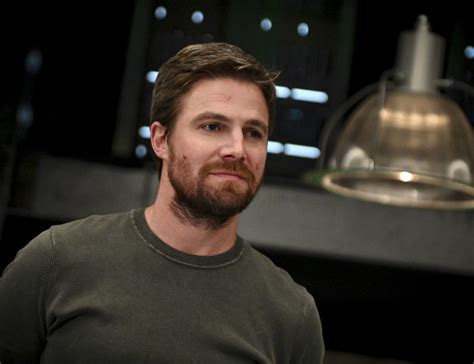 Arrow Oliver Queen Returns To The Arrowcave In New Photos From Season