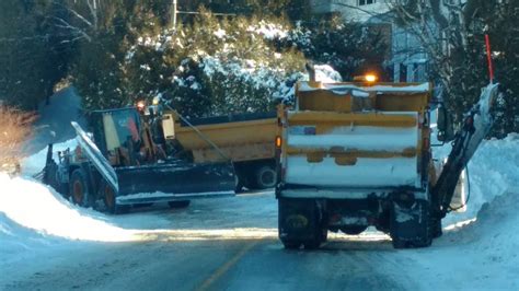 City Plow Truck Stuck Sideways Hauled Out By Front End Loader Youtube