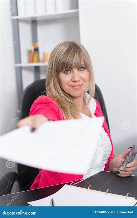 Woman Is Handing Over A Document Stock Photo Image Of Communication