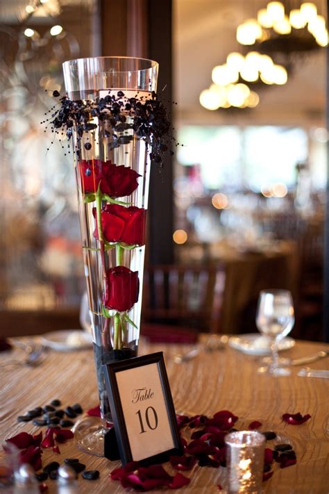 Submerged Red Roses As A Centerpiece Work Ideas