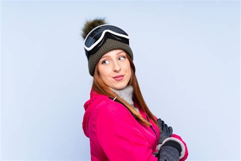 Premium Photo Skier Redhead Woman With Snowboarding Glasses Over