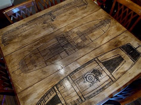 Modge podge or white glue. 59 DECOUPAGE MAP ON COFFEE TABLE