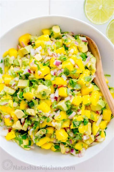 This mango salsa recipe adds a sweet and spicy compliment to a fish dish. Mango Salsa with Avocado - NatashasKitchen.com