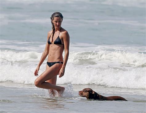 Gisele Bundchen In A Bikini On The Beach With Her Sister Gabriela In