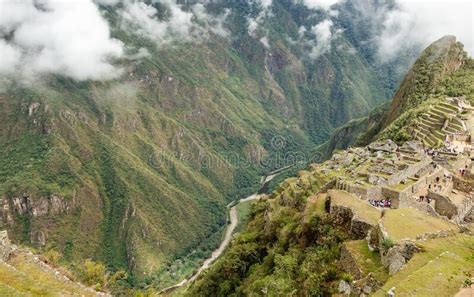 Landscape Of Machu Picchu Covered In The Fog At Daytime In Peru Stock