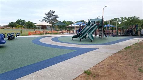 Expanding A Playground Using Poured Rubber Surfacing W Photos