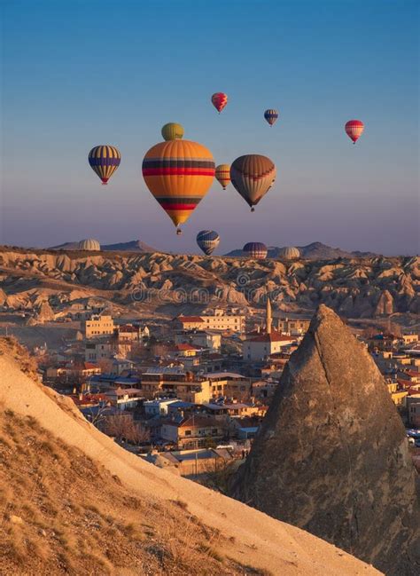 Goreme Cappadocia Turkey Hot Air Balloons Fly At Sunrise Over The