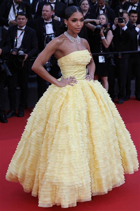 Lori Harvey Exudes Glamour In Yellow Ballgown On Cannes Red Carpet