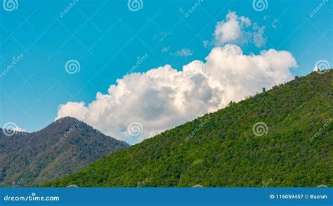 Cumulus Clouds Over Green Mountains Stock Image Image Of High