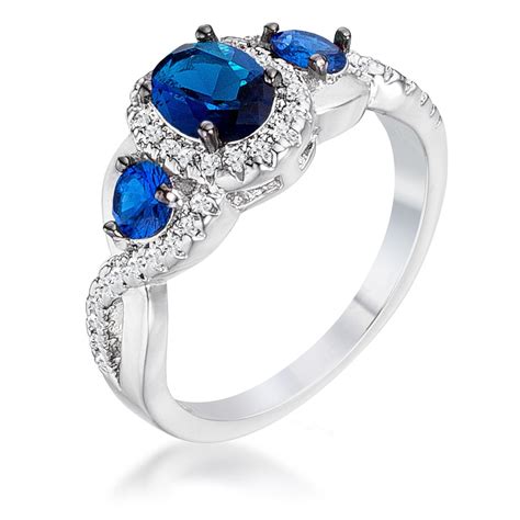 Blue Sapphire And Clear Cubic Zirconia Three Stone Twisted Ring