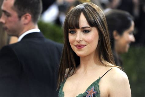 Dakota Johnson Snapped Topless While Filming Fifty Shades Of Grey
