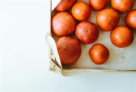 Box Of Round Brown Fruits · Free Stock Photo