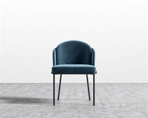 The Timeless Silhouette Of The Angelo Dining Chair Exudes Luxury Within