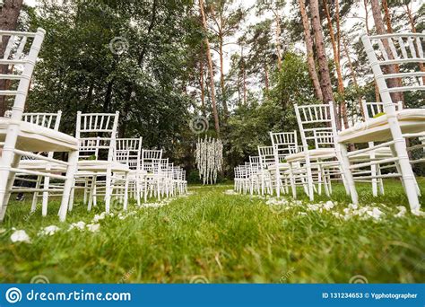• the seatway is the distance from the furthest rear point of the chairs on row a to the nearest forward point of row b behind it. Between Rows Of White Chairs Stock Image - Image of formal ...