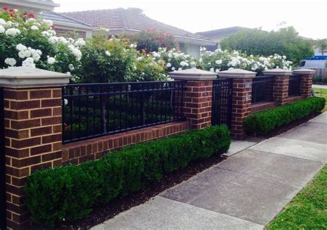Low Brick Fence With Pillars And Box Hedge Boarder Modern Design