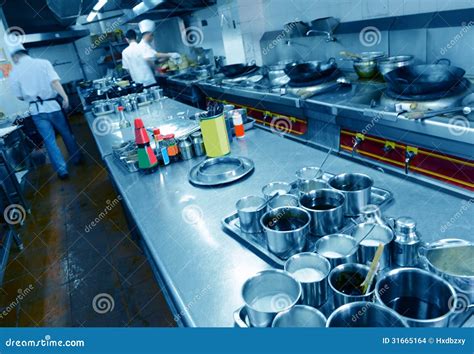 Motion Chefs Of A Restaurant Kitchen Stock Image