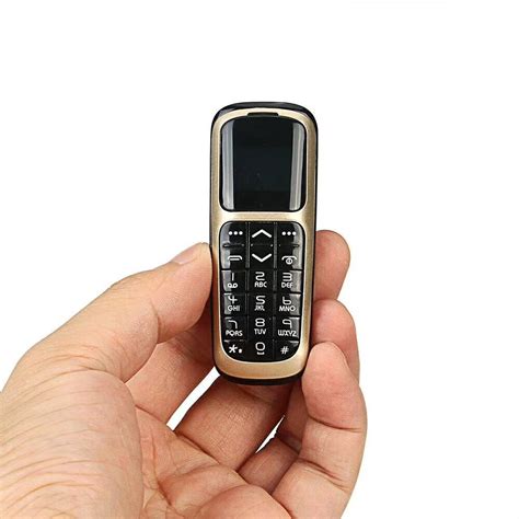 Best V2 Smallest Mini Phone Bluetooth Dialer 066 With Hands Free
