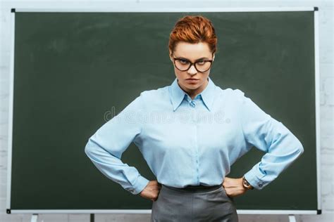 Strict Teacher In Eyeglasses Looking At Stock Image Image Of Emotional Chalkboard 192130387